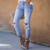 muchos agujeros desgastados en los nuevos jeans de nueve puntos de cintura alta para mujeres NSSI2748