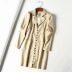 Vestido de traje abotonado con textura de manga de soplo retro de lino de algodón de otoño al por mayor NSAM3843