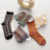 Calcetines de otoño e invierno para mujer calcetines de tubo medio lindos al por mayor NSFN4072