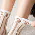 mujer otoño e invierno nuevos calcetines de tubo calcetines florales callejeros NSFN4091