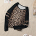 Suéter de cuello redondo de leopardo de estilo callejero con costura de otoño de manga larga para mujer NSSI2383