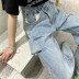 ripped high-waisted denim trousers  NSHS23388