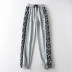 pantalones con estampado de leopardo y costuras NSHS23799