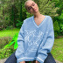 loose V-neck pattern pullover sweater nihaostyles wholesale clothing NSXIA87940
