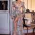 autumn sexy long-sleeved V-neck hollow backless printed dress nihaostyles wholesale clothing NSXIA93490