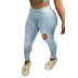 Jeans ajustados rasgados con cintura alta y elástico alto NSWL97445