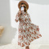 autumn high collar trumpet sleeve pleated floral dress nihaostyles wholesale clothing NSDMB88628