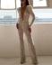 V-neck sprinkling gold long-sleeved mesh see-through jumpsuit nihaostyles wholesale clothes NSGRM102615