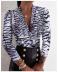 Camisa sexy con estampado de tigre y leopardo de manga larga con cuello en V NSXPF103977