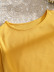 Camiseta amarilla de manga corta con ribete de flores huecas de talla grande NSOY104706