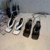 sandalias de tacón medio con tiras y cordones NSCA35680