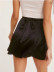 diseño de correa de cintura falda de color sólido de cintura alta NSLD38062