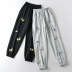 Pantalones deportivos casuales bordados con mariposas elásticas NSHS44293