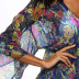blusa de playa irregular con estampado floral NSOY45993