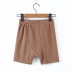 shorts deportivos con bordado de color liso de cintura alta NSHS39211