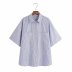 Blusa oversize de popelina con manga media y solapa con rayas azules NSAM47437