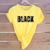 camiseta de manga corta con estampado de niña negra con letras negras NSYIC56503