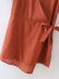 V-neck solid color side lace-up irregular short-sleeved jumpsuit  NSAM55337