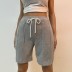 verano nuevos pantalones de cinco puntos de encaje de color sólido nihaostyle ropa al por mayor NSYIC69358