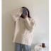 Suéter suelto con cuello redondo y manga larga NSSX73246