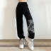 cashew flower stitching leg drawstring slim pants nihaostyles clothing wholesale NSXPF75173