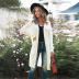 autumn and winter women s pure color twist long knitted sweater cardigan nihaostyles wholesale clothing NSSI79471