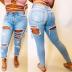 women s ripped slim jeans nihaostyles wholesale clothing NSWL80487