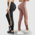 leggings de yoga huecos de cintura alta para mujer nihaostyles ropa al por mayor NSSMA77417