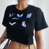 Camiseta corta de manga corta con cuello redondo y tirantes dobles con estampado de mariposas NSGYB111778