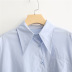 Camisa suelta irregular de manga larga con solapa NSFYF113701