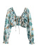 Conjunto de top y falda con estampado de cordones manga larga cuello en V y borde fúngico NSXFL114530