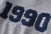 Suéter de manga larga con cuello en V y dobladillo elástico con estampado de letras NSXDX137523