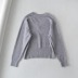 Suéter de manga larga con cuello en V y dobladillo elástico con estampado de letras NSXDX137523