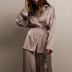 solid color satin long-sleeved lace up shirt and loose trousers two-piece set NSSQS137679