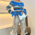 Suéter corto ajustado de manga larga con dobladillo con borlas en color de contraste con cuello de una palabra NSCOK137869