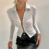 blusa de manga larga delgada con costuras de metal en la solapa de color sólido NSBJD138026