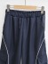 Pantalones rectos holgados de color liso con cintura elástica y bolsillos grandes NSXDX137327