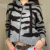Suéter suelto de manga larga con cinta con capucha y cremallera completa estampada NSGXF139319