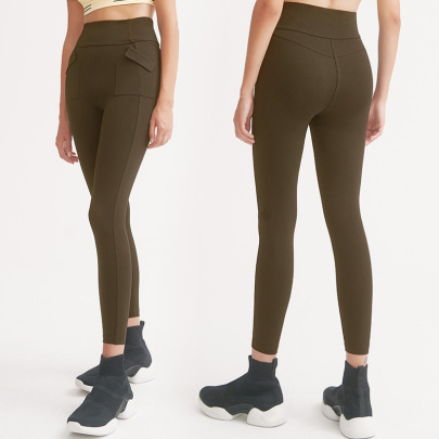 High Waist Pocket Hip-lifting High-elastic Solid Color Yoga Pant NSYWH139367