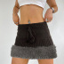 falda de punto de lana de color solod con costuras de cintura baja NSGXF139398