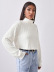 suéter de punto de color sólido corto suelto de manga larga con cuello alto NSNCK139743