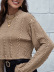 suéter de punto de color sólido corto suelto con cuello levantado NSNCK139747