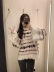 suéter estampado con borde ondulado suelto de manga larga con cuello redondo NSYXB139792