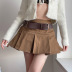 Falda plisada de talle alto en color liso primavera con cinturón NSSSN119625