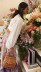 traje de dos piezas con top corto de manga larga y cuello en V de color liso y falda estampada NSJKW121190
