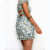 floral short-sleeved low-cut hollow drawstring top and skirt two-piece set NSCXY121647