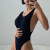 sling backless low-cut slim solid color jumpsuit NSGWY123159