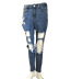 jeans slim con tiro alto y rotos NSGJW117318