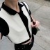 hit color stitching knitted short-sleeved buttoned lapel top NSXDX117534