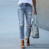 jeans slim con borlas rasgadas NSWL123955